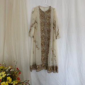 Beautiful cream color outfit.  With duppata